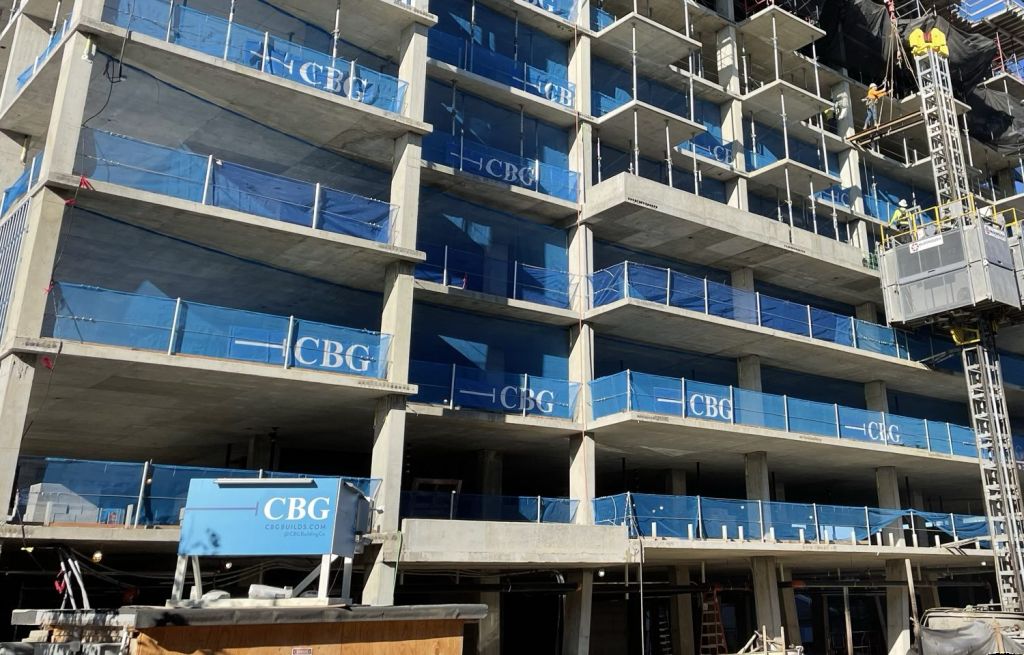 CBG blue printed debris netting QVP-427 on a construction site by Quiet Valley Products