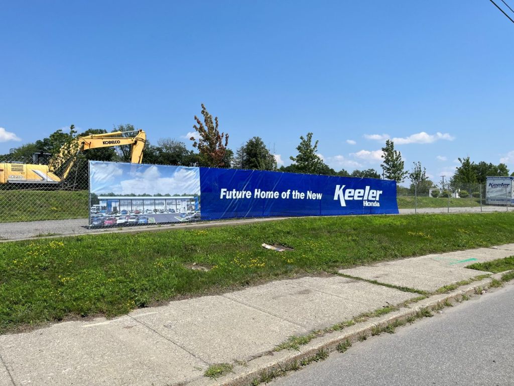 Future Home of the New Keeler Honda full-color mesh banner on a site fence